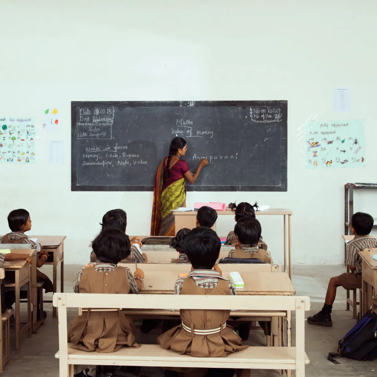 Teacher engaging students at The NEST School